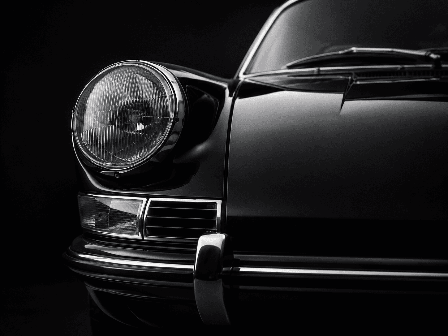 Dramatic cropped detail of a classic collector automobile